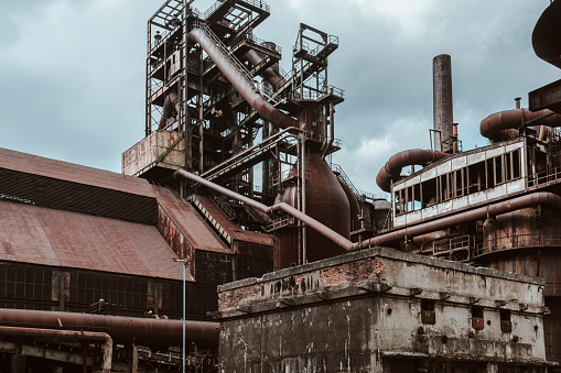 Metallurgical plant blast furnace and smokestacks. Industrial iron background, Ostrava.