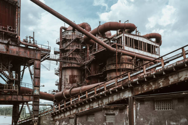 Rusty industrial pipeline equipment scene in the old steel mill.