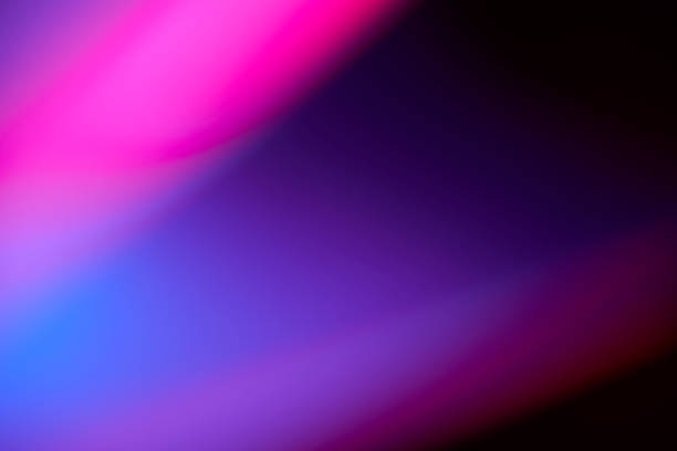 abstract defocused lens color gradient on black background - neon light fotos imagens e fotografias de stock