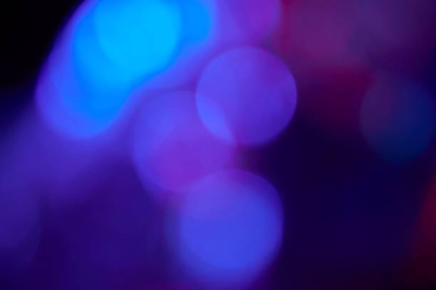 Abstract red and blue defocused lights on black background