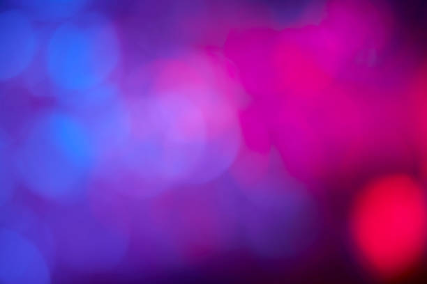 istock Abstract red and blue defocused lights background 1404222169