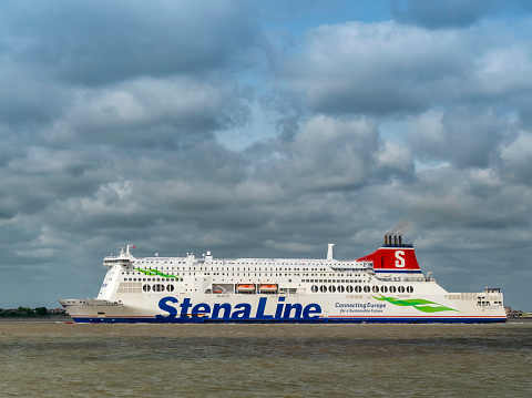 A Stena Line ferry, the ‘Stena Hollandica’ has left Harwich International Port (formerly Parkeston Quay) and is heading through Harwich Harbour towards the North Sea, probably on its way to the Hook of Holland on its twice-daily service. Harwich is in the background.