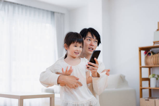 istock Parents and children using IoT appliances 1404223146