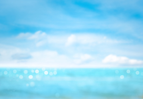 Abstract defocused sea and sky background. Blurred summer background.