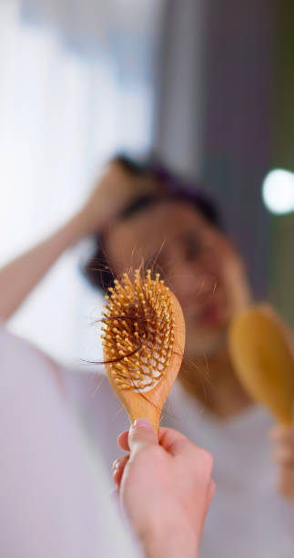 istock man worried about hair loss 1404223988