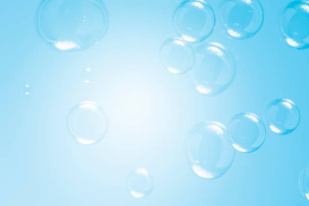 istock Abstract Beautiful Transparent Blue Soap Bubbles Background. Soap Sud Bubbles Water 1404226114
