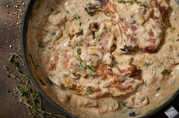 istock Braised Pork Chops in Creamy Mushroom Sauce 1404226494