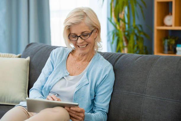 istock Woman going through her finances on her Ipad 1404227610