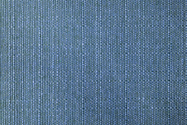 istock Close up texture of blue coarse weave upholstery fabric. Decorative textile background 1404227618