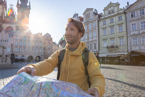 Solo travel man exploring the city and the famous landmark. \nPrague, Czech Republic