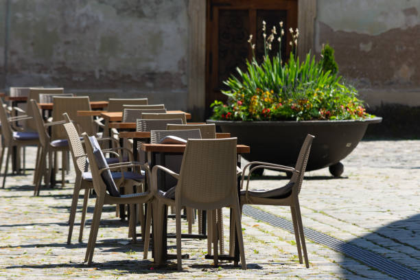 istock Empty restaurant terrace tables in the sun 1404236590