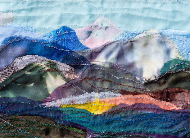mountain landscape hand-stitched with patchwork stock photo