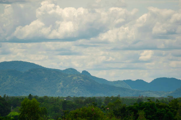 istock beautiful hill and forest on blue sky and clouds background 1404238852