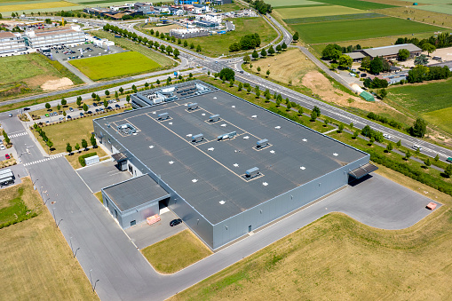 Large industrial buildings and office park. Developing area - aerial view