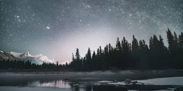 istock Stars at Night over a Mountain Landscape in Alberta 1404241586