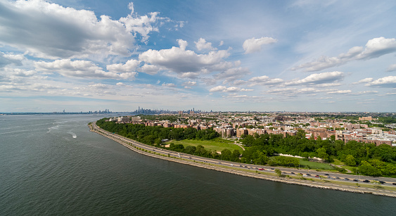 Distant aerial view of Manhattan from Brooklyn on a sunny summer day.