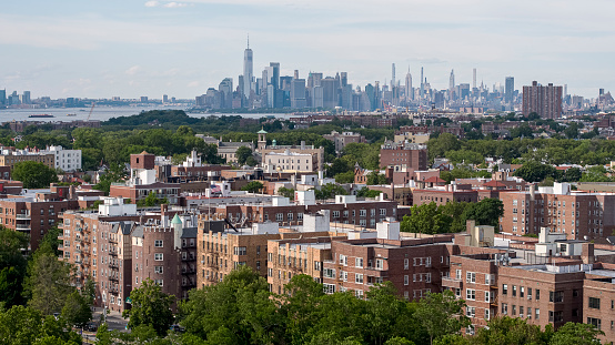 Distant aerial view of Manhattan from Brooklyn on a sunny summer day.