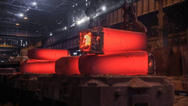 istock Hot red steel slabs in iron foundry workshop. 1404244974