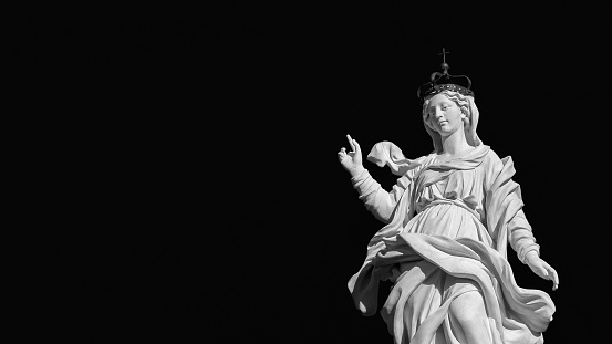 Statue of Virgin Mary of the Stars at the top of an ancient column in the historic center of Lucca, erected in 1687