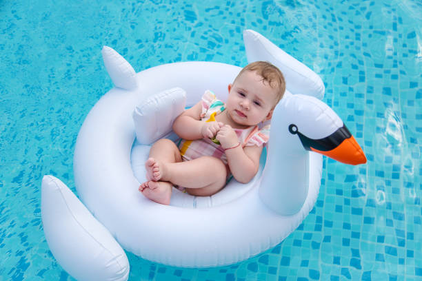 istock High Angle View Of Baby Boy With Teddy Bear 1404246917