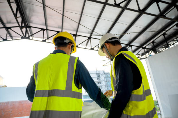 istock Civil Engineer and Construction Supervisor inspect the internal construction of building at construction site. Construction engineers or architect and Foreman inspect the construction inside building. 1404247120