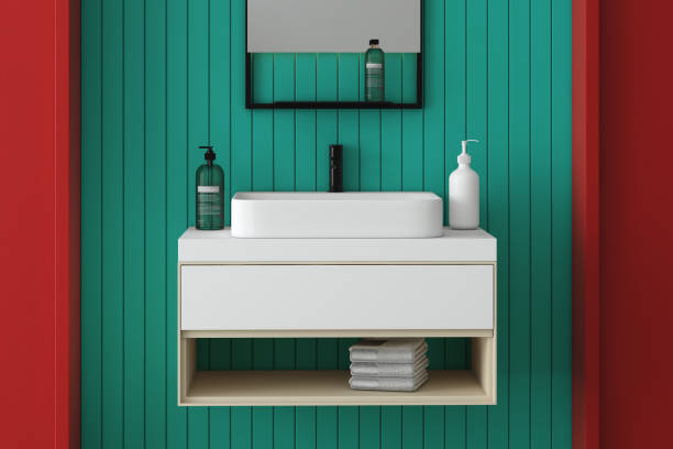 istock Close up of sink with square mirror standing in on blue wall, 1404247357