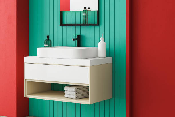 Close up of sink with square mirror standing in on blue wall,