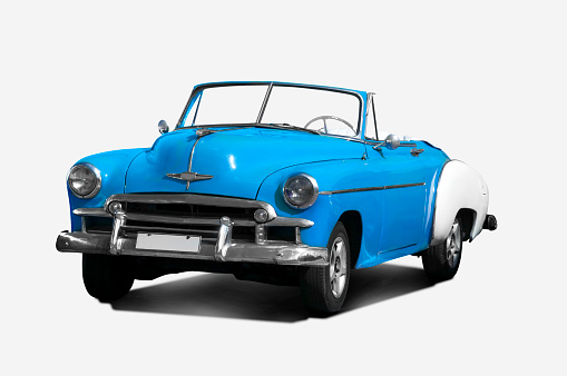 Convertible classic car from the 1950s on a white background.
