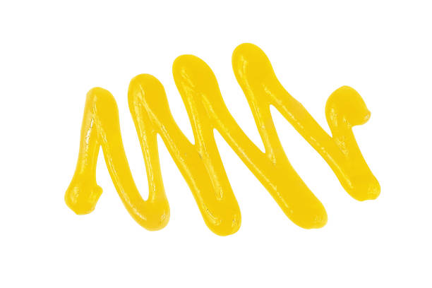 istock Cheese sauce on isolated white background 1404253927