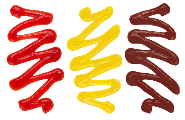 istock Ketchup, cheese sauce and bbq sauce on isolated white background 1404253958