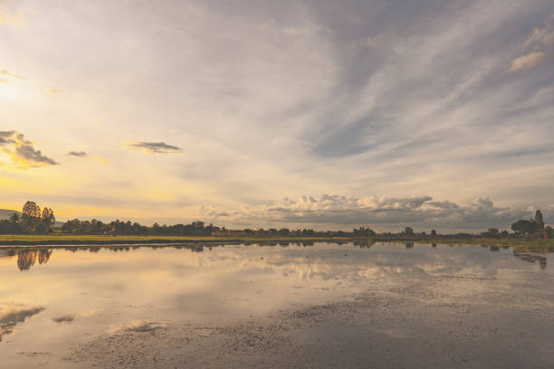 istock sunset sky and clouds in countryside background 1404255461