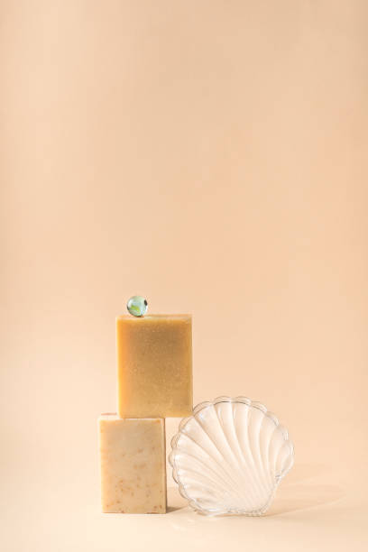 istock Balance composition with natural handcrafted soap and glass shell, nature concept with copy space. Natural beige soft  background, home decor, zero waste, eco friendly bathroom and spa accessories, Earth tones décor, copy space 1404255567