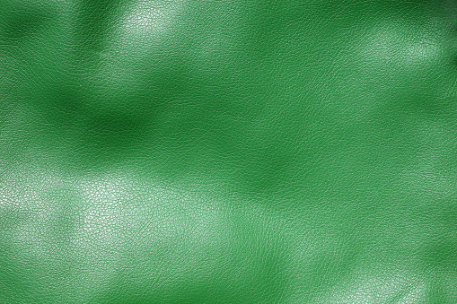 Background image of a textured leather surface