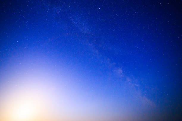 istock Moonrise in the midnight sky 1404259299