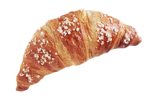 Fresh sweet croissant isolated on a white background, top view