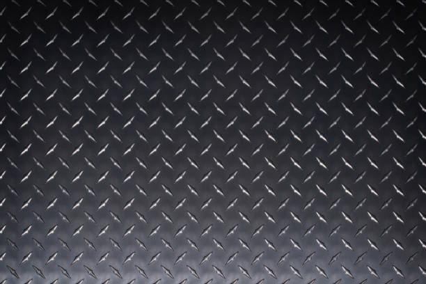 istock dark metal background, steel texture with diamond print. 1404277104
