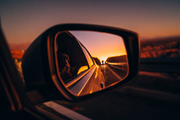Side mirror view on the road Road trip in Atacama desert rear view mirror stock pictures, royalty-free photos & images