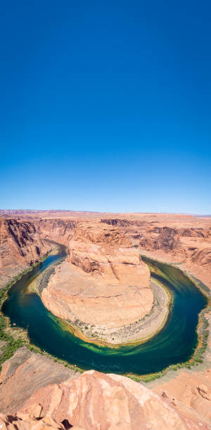 istock Panoramic view of Horseshoe Bend in Page, Arizona on a sunny day 1404283493