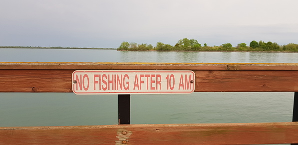 No Fishing After 10 AM sign