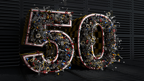 Yellow and black toolbox in the shape of the number 50 from which an explosion of nuts, bolts, tools, metal parts, springs and spheres comes out against a background of dark metal plates. 3D Illustration