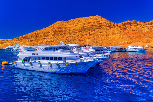 Sharm el Sheikh, Egypt, July 26 2021: Diving or boats for various tourist excursion in port of Sharm el Sheikh, Egypt.