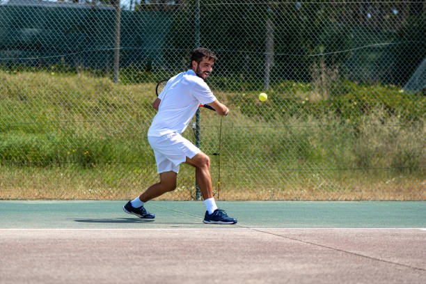 istock Tennis player performing a drop shot 1404292255