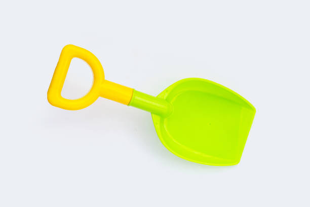 istock Plastic summer toy, shovel on white background. 1404292262