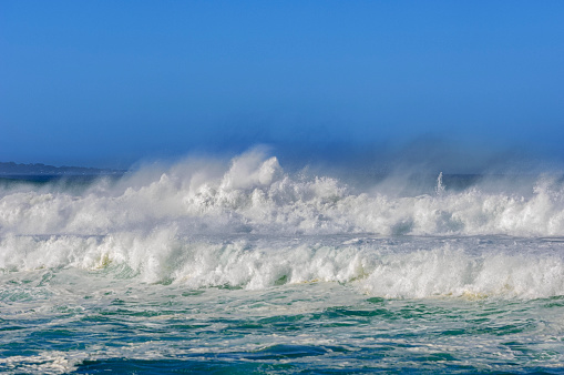 Large turbulent ocean waves off California Coast, after a pacific coast storm passed through the area.

Taken from Marina Beach, California, USA