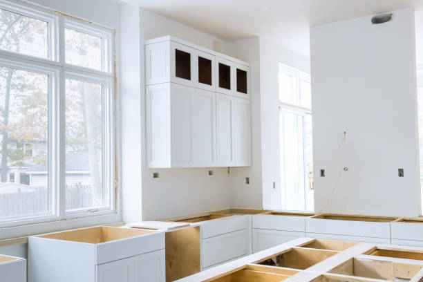 istock Assembly of kitchen furniture during kitchen remodeling 1404297096