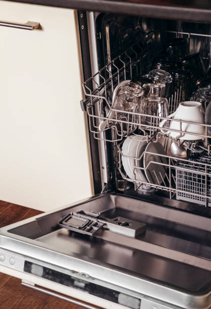 istock dishwasher with dishes, house cleaning 1404299725