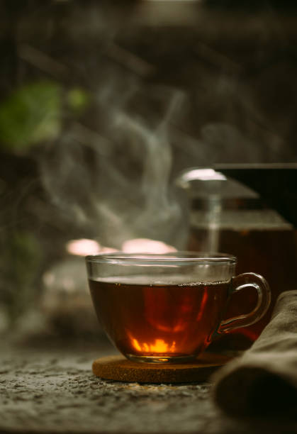 istock Hot black tea on a dark background 1404303066