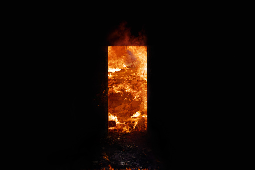 A flaming door, hell concept.