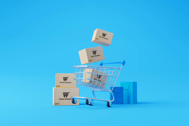 istock Online shopping concept. Web or mobile application e-commerce. Carton paper box with shopping cart and shopping bag on blue background. 3d rendering 1404313418