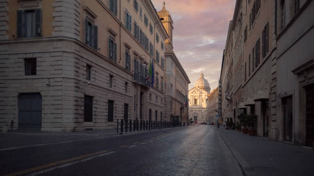 Street Ending With Sant'Andrea della Valle Basilica in Rome, Italy stock photo